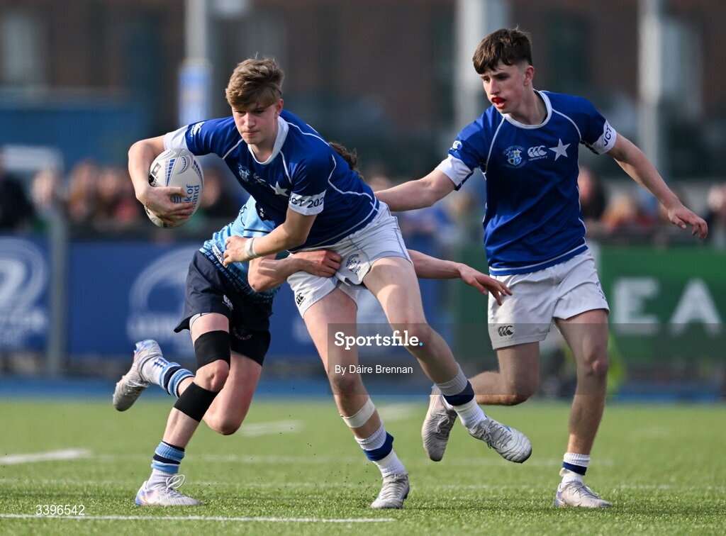 20 March 2026; Richard Cahill of St Mary’s College is tackled by Tommy Asple of St Michael’s College during the Bank of Ireland Leinster Rugby Boys Schools Junior Cup final match between St Mary's College and St Michael's College at Energia Park in Dublin. Photo by Daire Brennan/Sportsfile