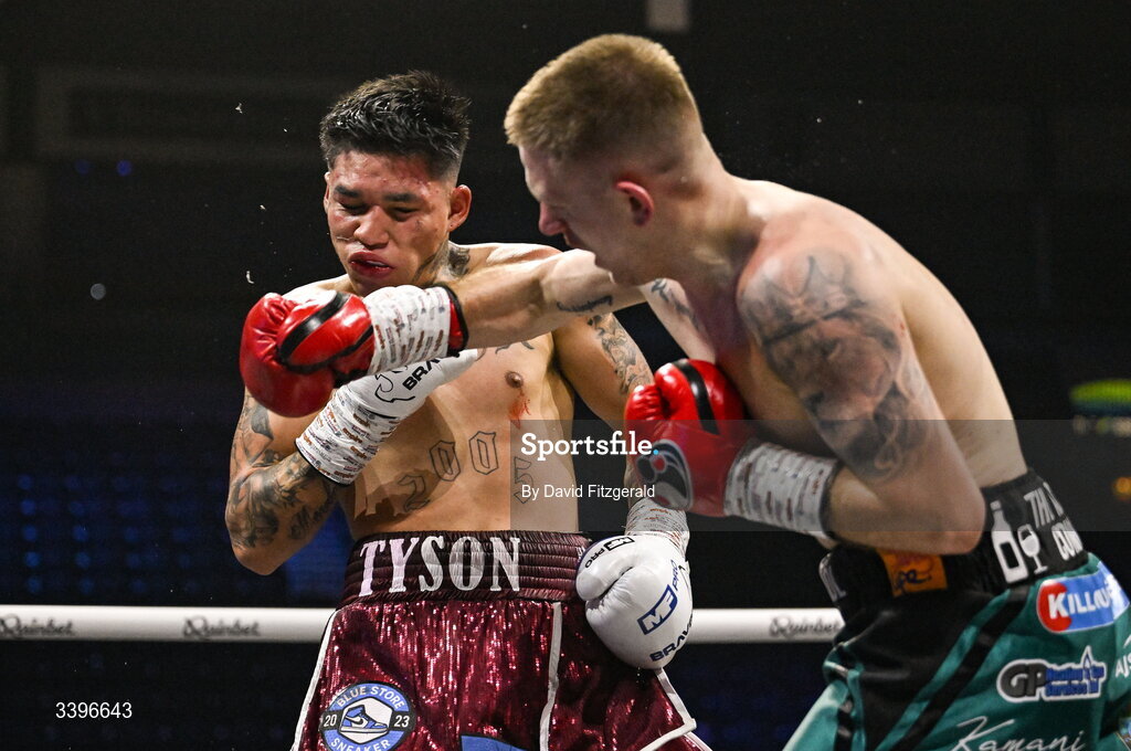 20 March 2026; Yahir Alexander Solorio Morales, left, takes a punch from Kurt Walker during their lightweight bout at the SSE Arena in Belfast. Photo by David Fitzgerald/Sportsfile