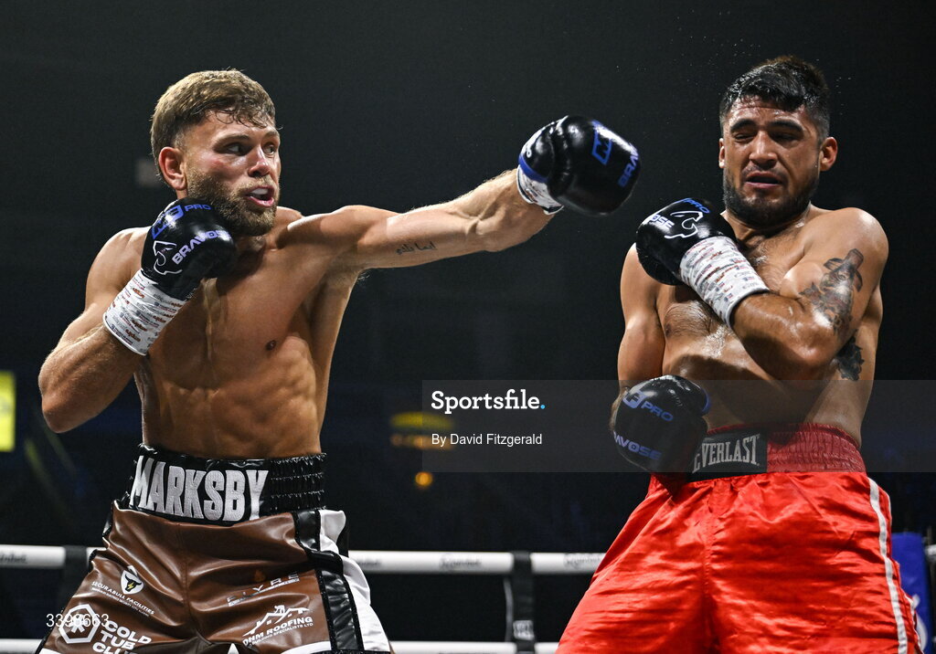 20 March 2026; Ben Marksby, left, in action against Carlos Daniel Cordoba during their super lightweight bout at the SSE Arena in Belfast. Photo by David Fitzgerald/Sportsfile