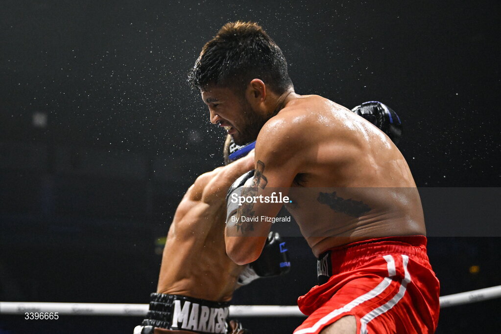 20 March 2026; Carlos Daniel Cordoba takes a punch from Ben Marksby during their super lightweight bout at the SSE Arena in Belfast. Photo by David Fitzgerald/Sportsfile