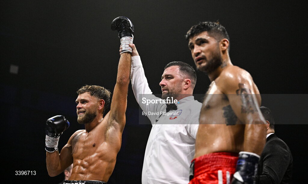 20 March 2026; Ben Marksby, left, celebrates his victory over Carlos Daniel Cordoba during their super lightweight bout at the SSE Arena in Belfast. Photo by David Fitzgerald/Sportsfile