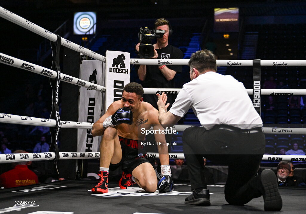 20 March 2026; Jacob Quinn is counted out by the referee during his super welterweight bout against Jak Corrie at the SSE Arena in Belfast. Photo by David Fitzgerald/Sportsfile