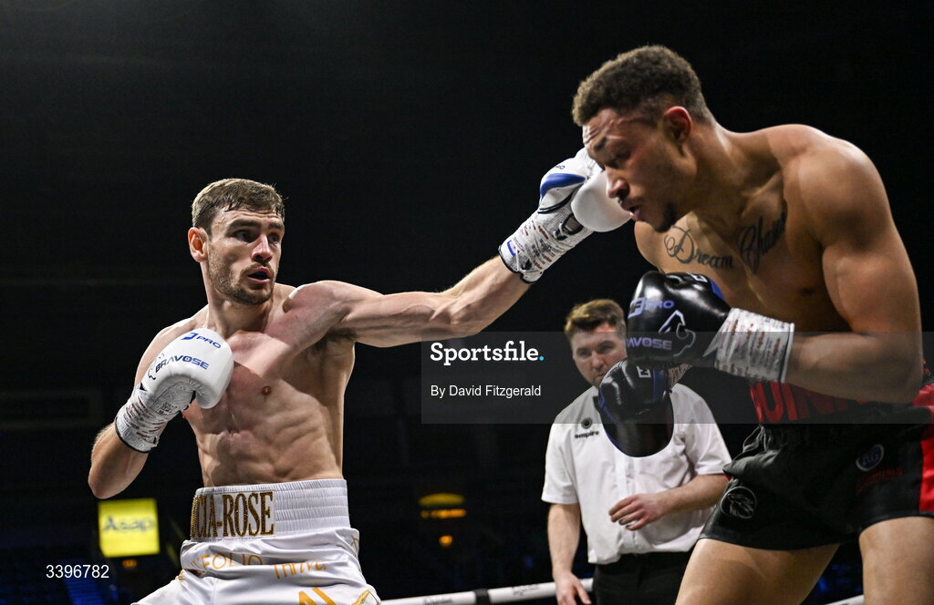 20 March 2026; Jak Corrie, left, in action against Jacob Quinn during their super welterweight bout at the SSE Arena in Belfast. Photo by David Fitzgerald/Sportsfile