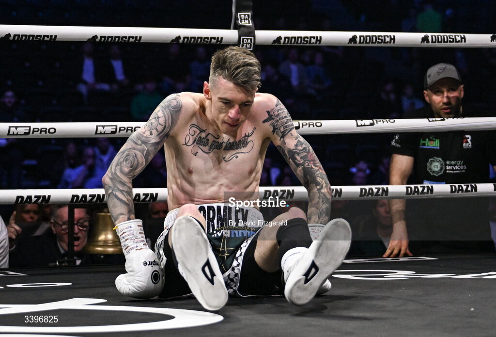 20 March 2026; Lee Gormley on the canvas after he was knocked doen for the first time against Codie Smith during their super featherweight bout at the SSE Arena in Belfast. Photo by David Fitzgerald/Sportsfile