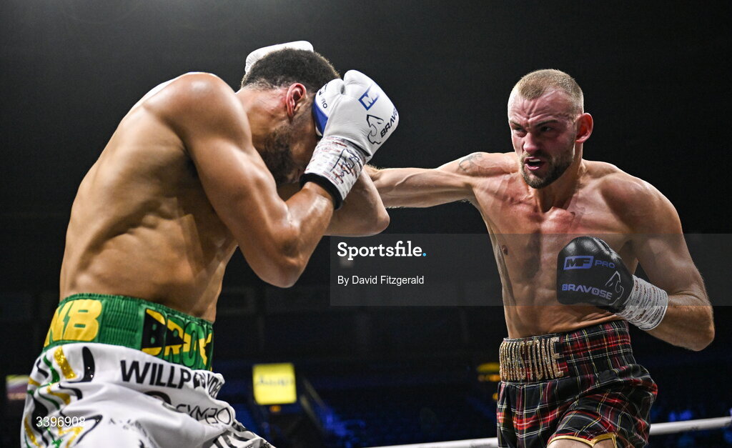 20 March 2026; Darren Johnstone, right, in action against Niall Browne during their British Super Middleweight Eliminator bout at the SSE Arena in Belfast. Photo by David Fitzgerald/Sportsfile