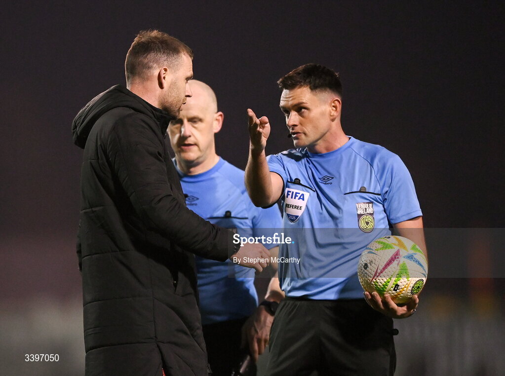 20 March 2026; Referee Rob Hennessy and Dundalk manager Ciaran Kilduff at half-time of the SSE Airtricity Men's Premier Division match between Bohemians and Dundalk at Dalymount Park in Dublin. Photo by Stephen McCarthy/Sportsfile