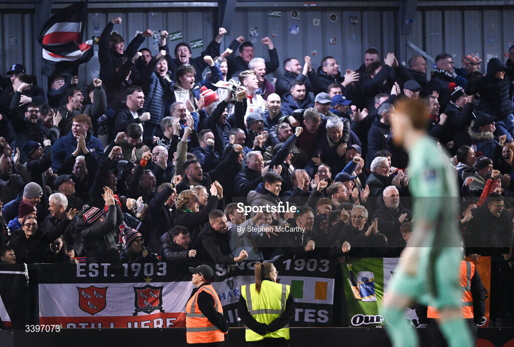 20 March 2026; Dundalk supporters celebrate their first goal during the SSE Airtricity Men's Premier Division match between Bohemians and Dundalk at Dalymount Park in Dublin. Photo by Stephen McCarthy/Sportsfile