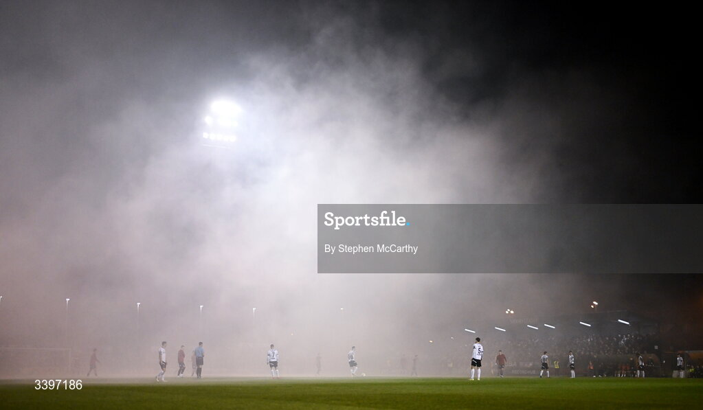 20 March 2026; Players await for smoke to clear before being able to kick-off the SSE Airtricity Men's Premier Division match between Bohemians and Dundalk at Dalymount Park in Dublin. Photo by Stephen McCarthy/Sportsfile