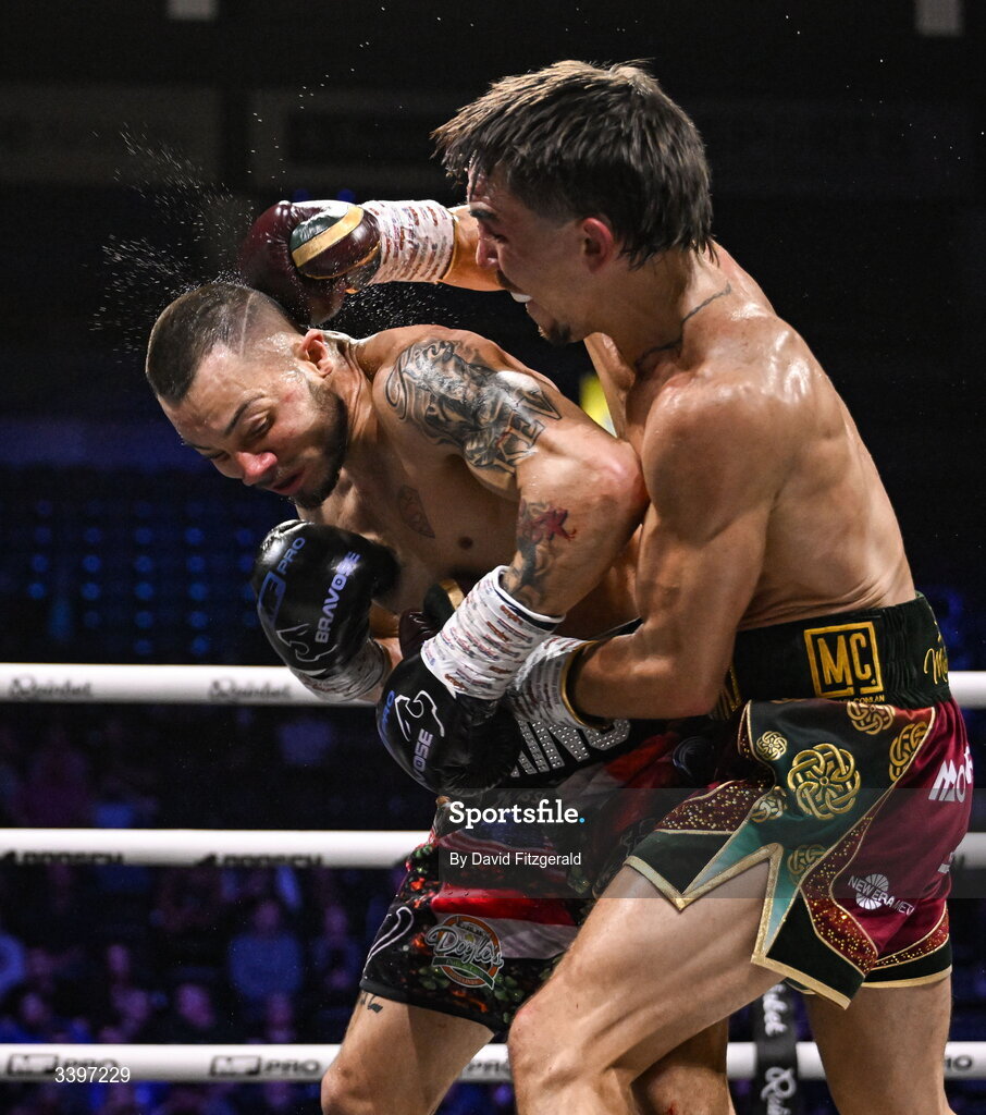 20 March 2026; Michael Conlan, right, in action against Kevin Walsh during their WBC featherweight title fight at the SSE Arena in Belfast. Photo by David Fitzgerald/Sportsfile