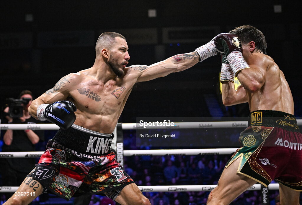20 March 2026; Kevin Walsh, left, and Michael Conlan exchange punches during their WBC featherweight title fight at the SSE Arena in Belfast. Photo by David Fitzgerald/Sportsfile