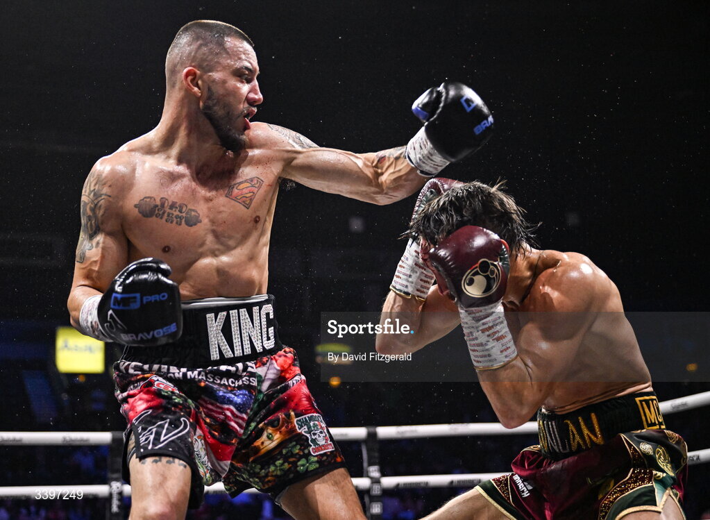 20 March 2026; Kevin Walsh, left, and Michael Conlan exchange punches during their WBC featherweight title fight at the SSE Arena in Belfast. Photo by David Fitzgerald/Sportsfile