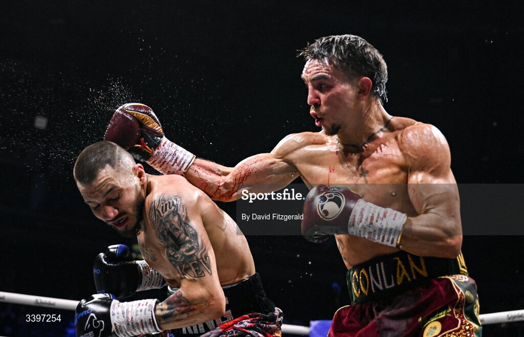 20 March 2026; Michael Conlan, right, in action against Kevin Walsh during their WBC featherweight title fight at the SSE Arena in Belfast. Photo by David Fitzgerald/Sportsfile