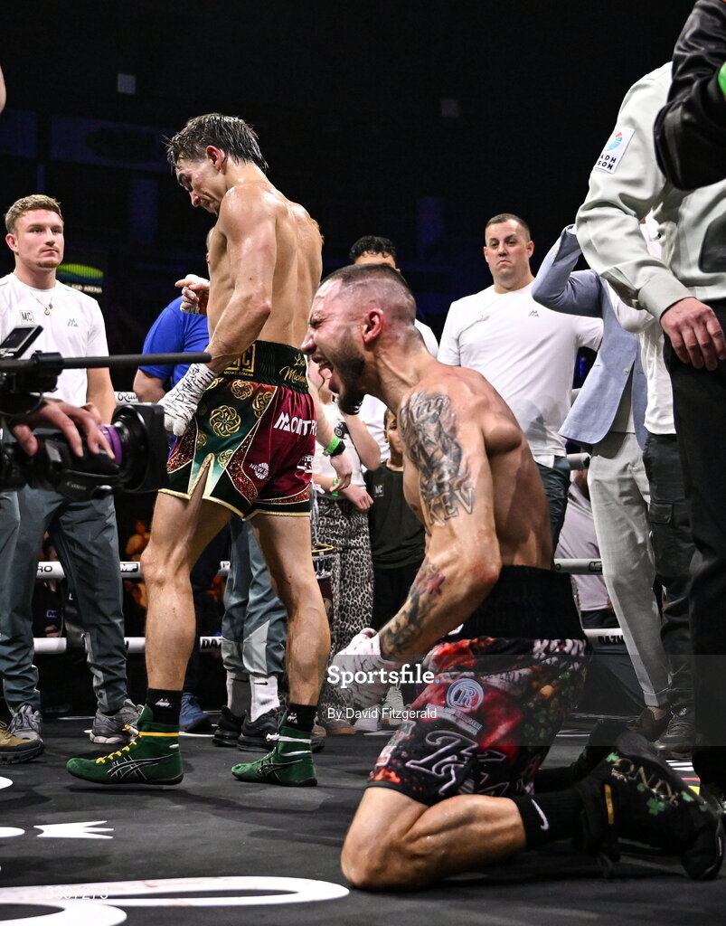 20 March 2026; Michael Conlan, left, reacts after being defeated by Kevin Walsh, right, in their WBC featherweight title fight at the SSE Arena in Belfast. Photo by David Fitzgerald/Sportsfile