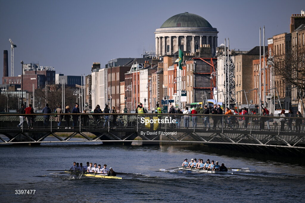 21 March 2026; The UCD Men's junior team, right, bow to stern, Josh Hanson, Matthew Gilson, Daithi Bowen, Luke Boyle, Luke Duffy, Jan Mizak, Senan Tighe, Cuan Moore, and cox Nisha Woolworth, contest the Dan Quinn Shield against the Trinity College junior team, bow to stern, Bjoern Martin, Phillip Cubbin, Odysseus Leonidoue, Hugo Faulkner, George Goor, Ethan Belleaubre, Cormac Lynch, and cox Emily Carrington during the 76th annual Colours Boat Race between UCD and Trinity College on the River Liffey in Dublin. Photo by David Fitzgerald/Sportsfile