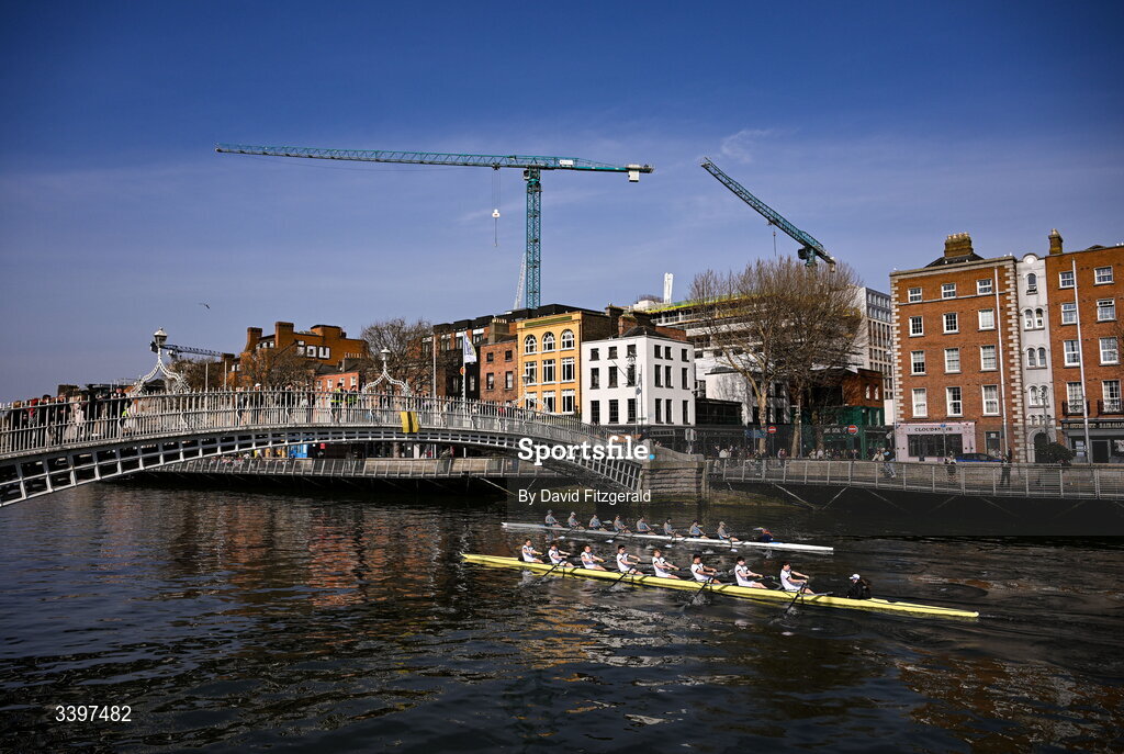 21 March 2026; The UCD Men's junior team, top, bow to stern, Josh Hanson, Matthew Gilson, Daithi Bowen, Luke Boyle, Luke Duffy, Jan Mizak, Senan Tighe, Cuan Moore, and cox Nisha Woolworth, contest the Dan Quinn Shield against the Trinity College junior team, bow to stern, Bjoern Martin, Phillip Cubbin, Odysseus Leonidoue, Hugo Faulkner, George Goor, Ethan Belleaubre, Cormac Lynch, and cox Emily Carrington during the 76th annual Colours Boat Race between UCD and Trinity College on the River Liffey in Dublin. Photo by David Fitzgerald/Sportsfile