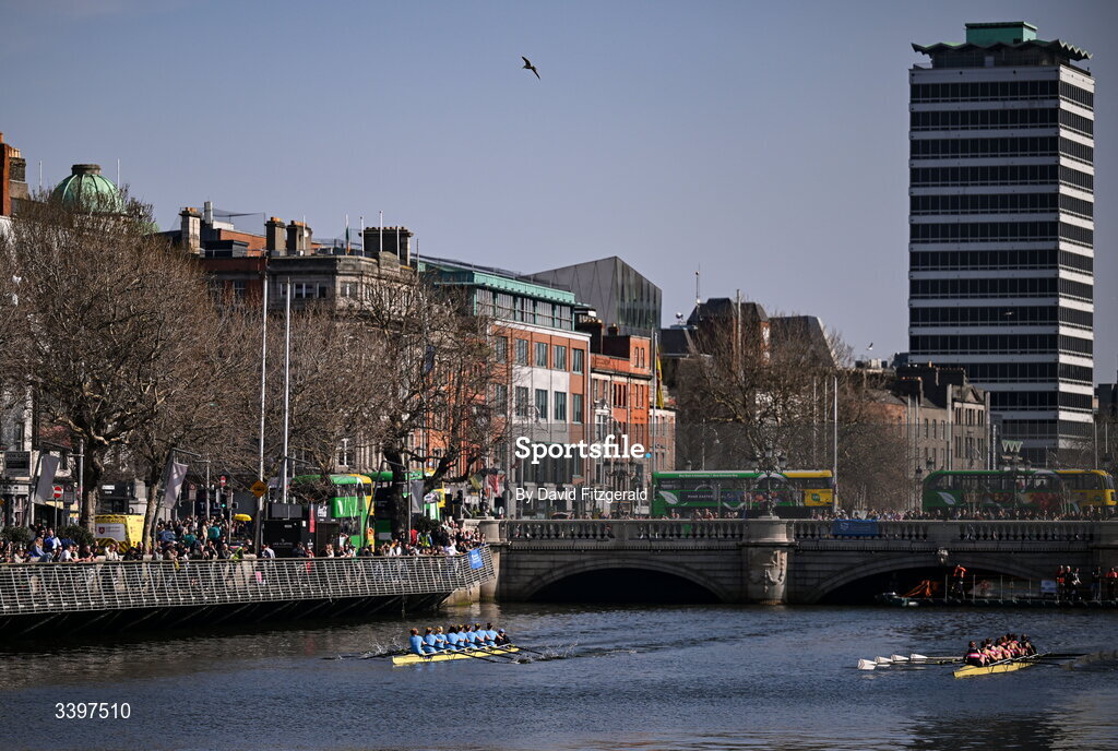 21 March 2026; The UCD Women's senior team, left, bow to stern, Grace O’Sullivan, Carrie Savage, Sophie Rhatigan, Molly Powell, Isabella Devitt, Orla O’Sullivan, Aoife Feeley, Ailíse O’Sullivan, and cox Neasa Farrell, contest the Corcoran Cup against the Trinity College Women's senior team bow to stern, Izzy Howley, Sarah Geoghegan, Danielle Lohrenz, Caoimhe Keller, Jen Forde, Ginevra Guglielmi, María Mezquita García-Poggio, Addy Telzrow, and cox Ava Dolan during the 76th annual Colours Boat Race between UCD and Trinity College on the River Liffey in Dublin. Photo by David Fitzgerald/Sportsfile