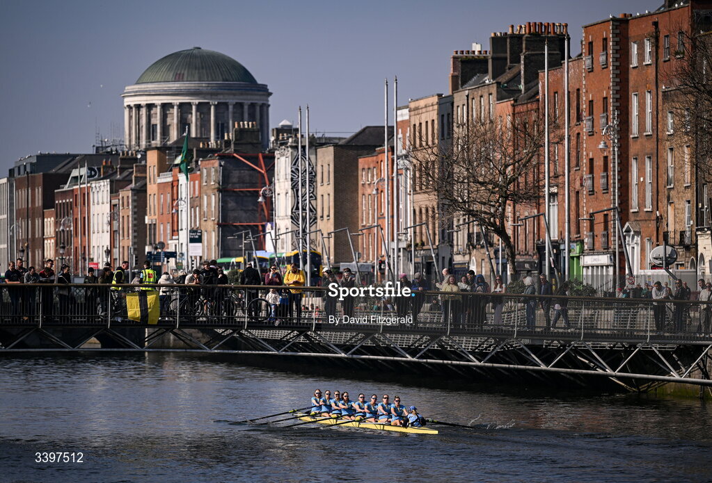 21 March 2026; The UCD Women's senior team, left, bow to stern, Grace O’Sullivan, Carrie Savage, Sophie Rhatigan, Molly Powell, Isabella Devitt, Orla O’Sullivan, Aoife Feeley, Ailíse O’Sullivan, and cox Neasa Farrell, contest the Corcoran Cup against the Trinity College Women's senior team during the 76th annual Colours Boat Race between UCD and Trinity College on the River Liffey in Dublin. Photo by David Fitzgerald/Sportsfile