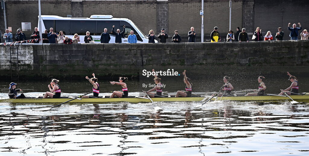21 March 2026; Trinity College Women’s Senior Eights team, bow to stern, Izzy Howley, Sarah Geoghegan, Danielle Lohrenz, Caoimhe Keller, Jen Forde, Ginevra Guglielmi, María Mezquita García-Poggio, Addy Telzrow, and cox Ava Dolan, celebrate after winning the Women’s Senior Eights race for the Corcoran Cup during the 76th annual Colours Boat Race between UCD and Trinity College on the River Liffey in Dublin. Photo by Seb Daly/Sportsfile