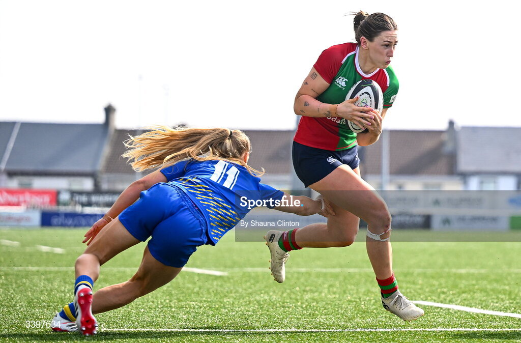 21 March 2026; Anna McGann of Clovers evades the tackle of Catherine Richards of Gwalia Lightning during the Celtic Challenge semi-final match between Clovers and Gwalia Lightning at Dexcom Stadium in Galway. Photo by Shauna Clinton/Sportsfile