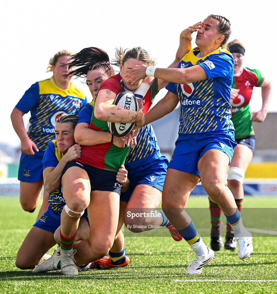 21 March 2026; Anna McGann of Clovers is tackled by Gwennan Hopkins of Gwalia Lightning during the Celtic Challenge semi-final match between Clovers and Gwalia Lightning at Dexcom Stadium in Galway. Photo by Shauna Clinton/Sportsfile