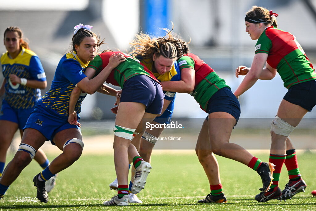 21 March 2026; Alaw Pyrs of Gwalia Lightning is tackled by Clovers players Aoibhe O’Flynn, left, and Emma Dunican during the Celtic Challenge semi-final match between Clovers and Gwalia Lightning at Dexcom Stadium in Galway. Photo by Shauna Clinton/Sportsfile