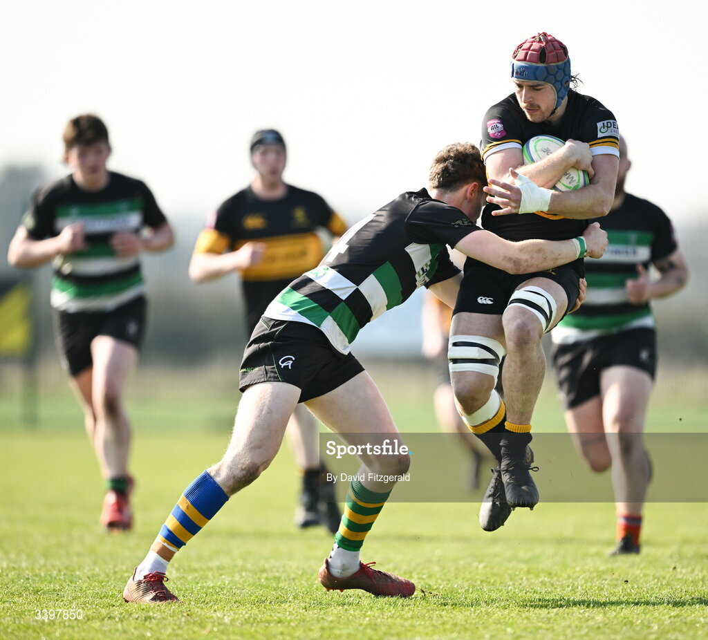 21 March 2026; Sam Lindeman of Malahide is tackled by Michael Connellan of Clonmel during the Energia All-Ireland League Men's Division 2C match between Malahide RFC and Clonmel RFC at Malahide RFC on Estuary Road in Dublin. Photo by David Fitzgerald/Sportsfile