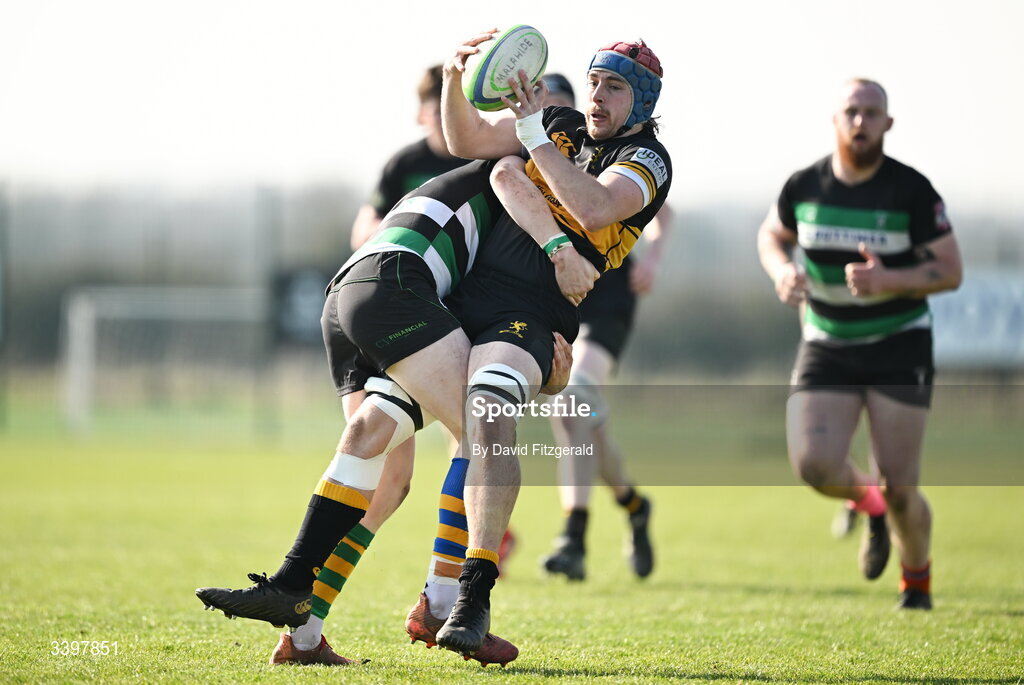 21 March 2026; Sam Lindeman of Malahide is tackled by Michael Connellan of Clonmel during the Energia All-Ireland League Men's Division 2C match between Malahide RFC and Clonmel RFC at Malahide RFC on Estuary Road in Dublin. Photo by David Fitzgerald/Sportsfile