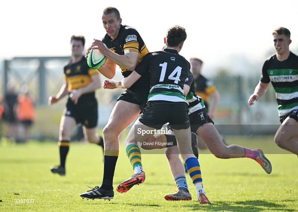 21 March 2026; David O'Halloran of Malahide is tackled by Michael Connellan of Clonmel during the Energia All-Ireland League Men's Division 2C match between Malahide RFC and Clonmel RFC at Malahide RFC on Estuary Road in Dublin. Photo by David Fitzgerald/Sportsfile