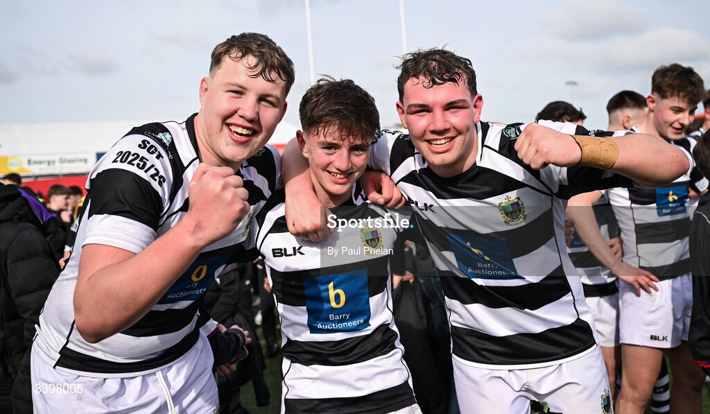 18 March 2026; Cathal Bruhn, Liam O'Brien and Ronan Dillon of Presentation Brothers College celebrate after the Pinergy Munster Schools Boys Senior Cup final match between Presentation Brothers College, Cork and St. Munchin’s College, Limerick at Virgin Media Park in Cork. Photo by Paul Phelan/Sportsfile
