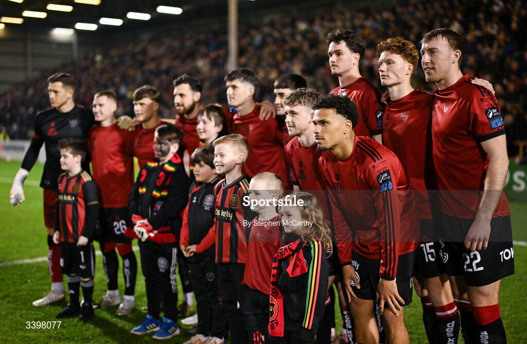 20 March 2026; Bohemians players line up with their mascots for a team photograph before the SSE Airtricity Men's Premier Division match between Bohemians and Dundalk at Dalymount Park in Dublin. Photo by Stephen McCarthy/Sportsfile