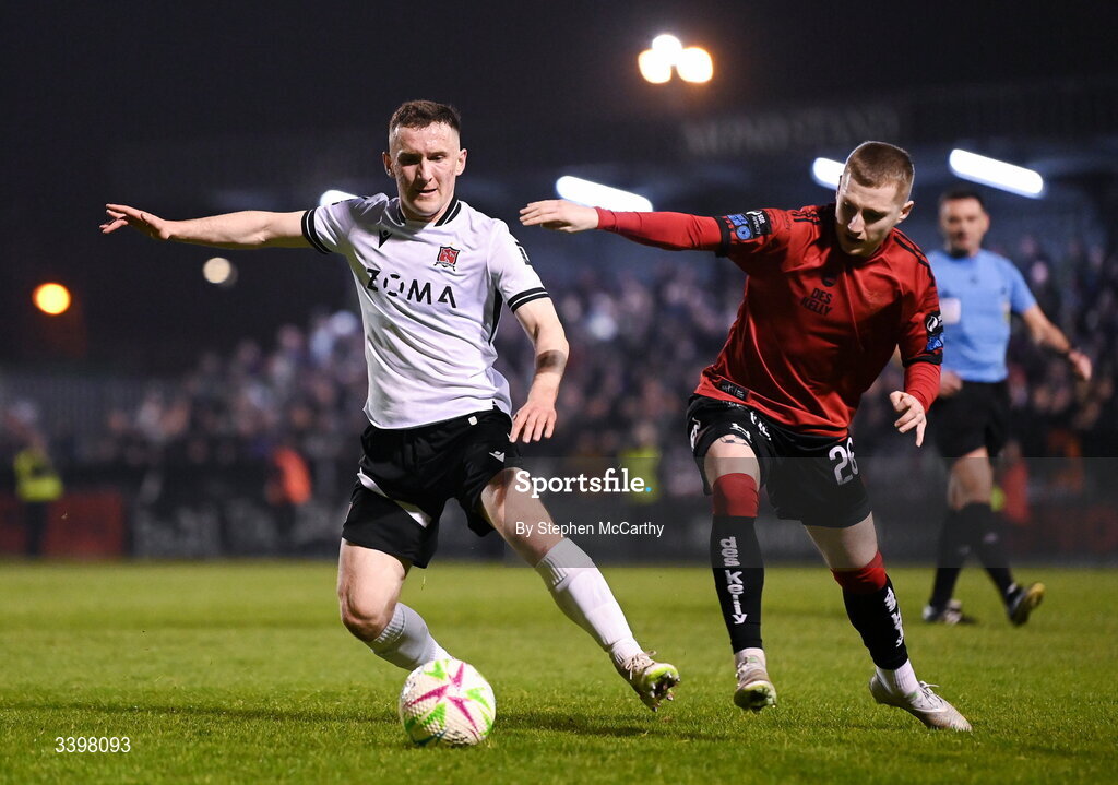 20 March 2026; Bobby Burns of Dundalk in action against Ross Tierney of Bohemians during the SSE Airtricity Men's Premier Division match between Bohemians and Dundalk at Dalymount Park in Dublin. Photo by Stephen McCarthy/Sportsfile