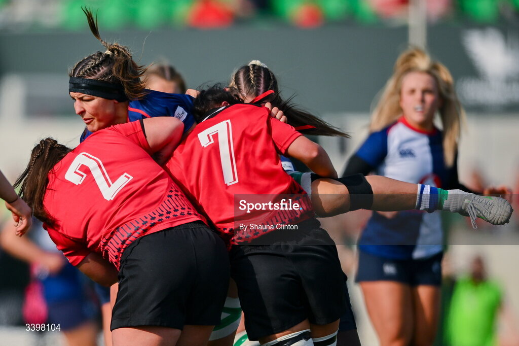 21 March 2026; Erin King of Wolfhounds is tackled by Brython Thunder players Shanelle Williams, left, and Lucy Isaac during the Celtic Challenge semi-final match between Wolfhounds and Brython Thunder at Dexcom Stadium in Galway. Photo by Shauna Clinton/Sportsfile