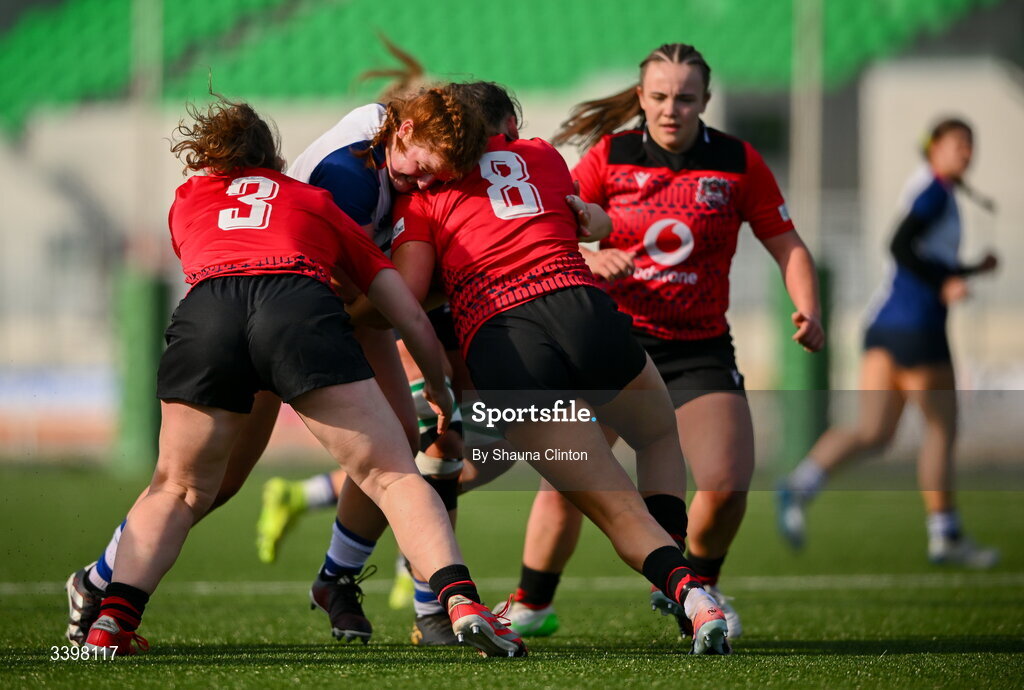 21 March 2026; Sophie Barrett of Wolfhounds is tackled by Brython Thunder players Elan Jones, left, and Jorja Aiono during the Celtic Challenge semi-final match between Wolfhounds and Brython Thunder at Dexcom Stadium in Galway. Photo by Shauna Clinton/Sportsfile