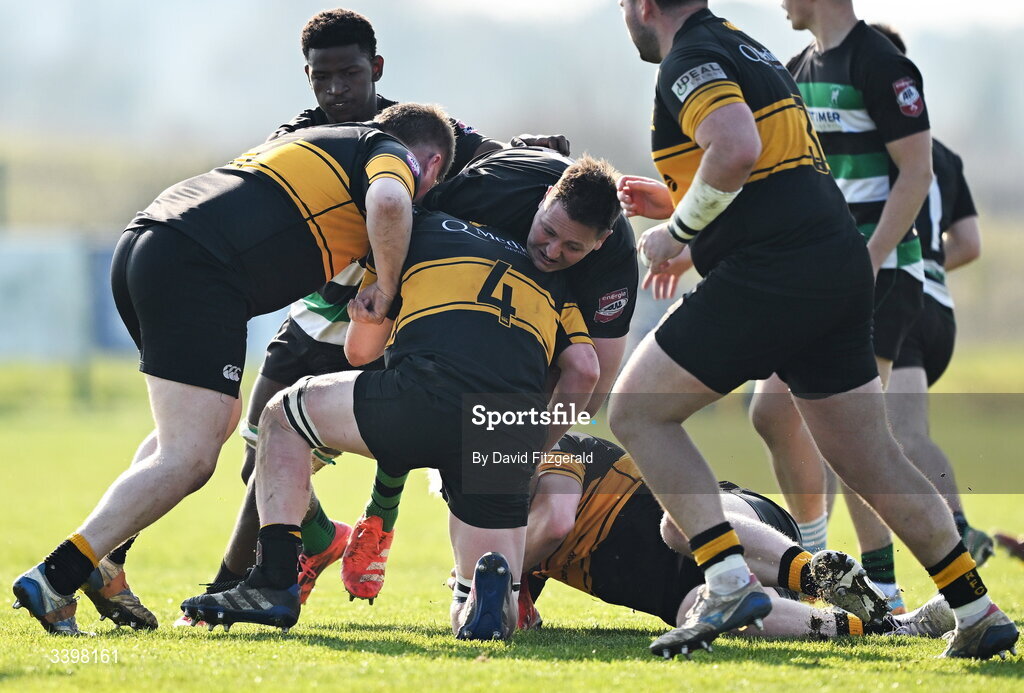 21 March 2026; Gerrit Huisamen of Clonmel is tackled by Marc Kelly of Malahide during the Energia All-Ireland League Men's Division 2C match between Malahide RFC and Clonmel RFC at Malahide RFC on Estuary Road in Dublin. Photo by David Fitzgerald/Sportsfile