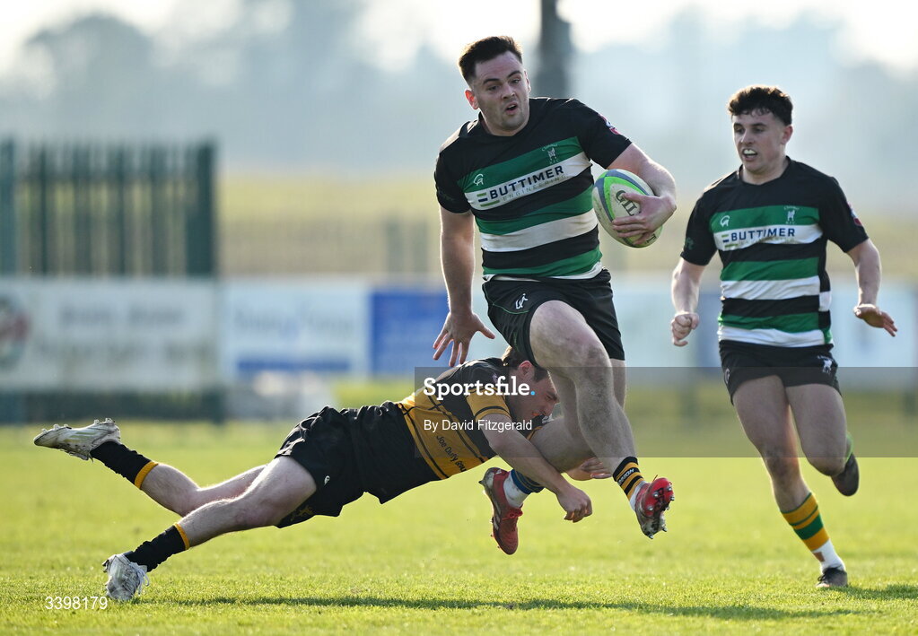 21 March 2026; Jack Walsh of Clonmel evades the tackle from Conrad Daly of Malahide during the Energia All-Ireland League Men's Division 2C match between Malahide RFC and Clonmel RFC at Malahide RFC on Estuary Road in Dublin. Photo by David Fitzgerald/Sportsfile