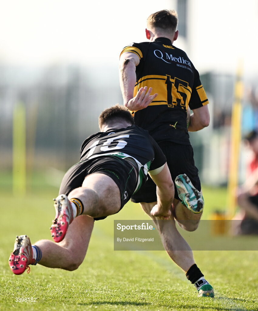 21 March 2026; James McKeown of Malahide is tackled by Jack Walsh of Clonmel during the Energia All-Ireland League Men's Division 2C match between Malahide RFC and Clonmel RFC at Malahide RFC on Estuary Road in Dublin. Photo by David Fitzgerald/Sportsfile