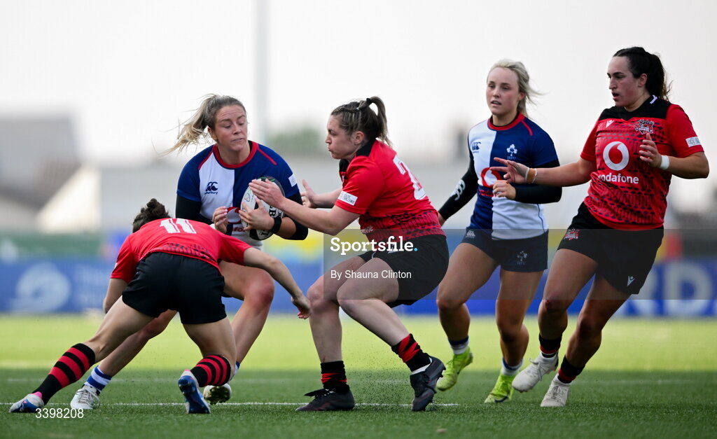 21 March 2026; Stacey Flood of Wolfhounds in action against Brython Thunder players Seren Singleton, left, and Hannah Bluck during the Celtic Challenge semi-final match between Wolfhounds and Brython Thunder at Dexcom Stadium in Galway. Photo by Shauna Clinton/Sportsfile