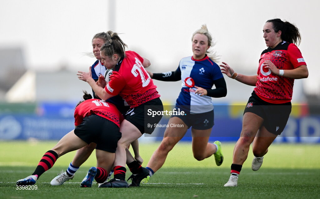 21 March 2026; Stacey Flood of Wolfhounds in action against Brython Thunder players Seren Singleton, left, and Hannah Bluck during the Celtic Challenge semi-final match between Wolfhounds and Brython Thunder at Dexcom Stadium in Galway. Photo by Shauna Clinton/Sportsfile