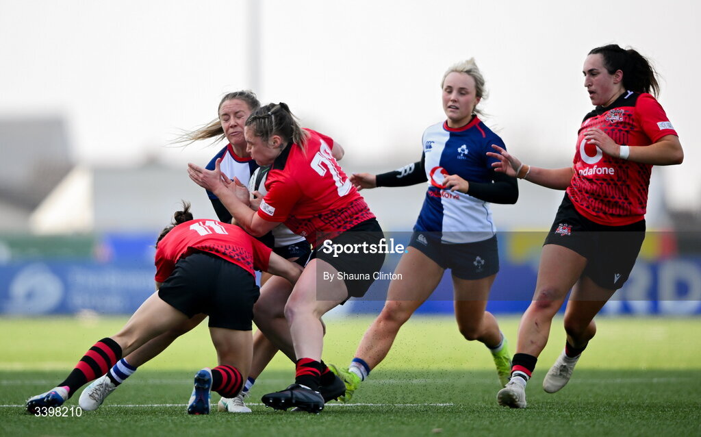 21 March 2026; Stacey Flood of Wolfhounds in action against Brython Thunder players Seren Singleton, left, and Hannah Bluck during the Celtic Challenge semi-final match between Wolfhounds and Brython Thunder at Dexcom Stadium in Galway. Photo by Shauna Clinton/Sportsfile