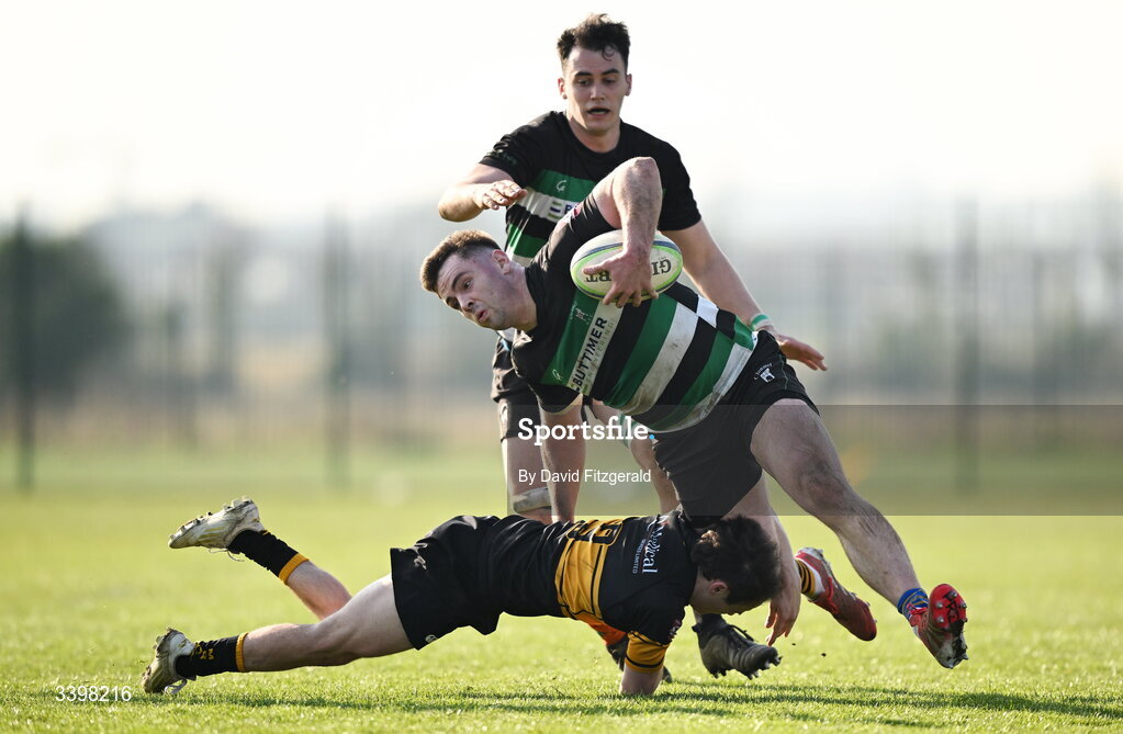 21 March 2026; Jack Walsh of Clonmel is tackled by Conrad Daly of Malahide during the Energia All-Ireland League Men's Division 2C match between Malahide RFC and Clonmel RFC at Malahide RFC on Estuary Road in Dublin. Photo by David Fitzgerald/Sportsfile