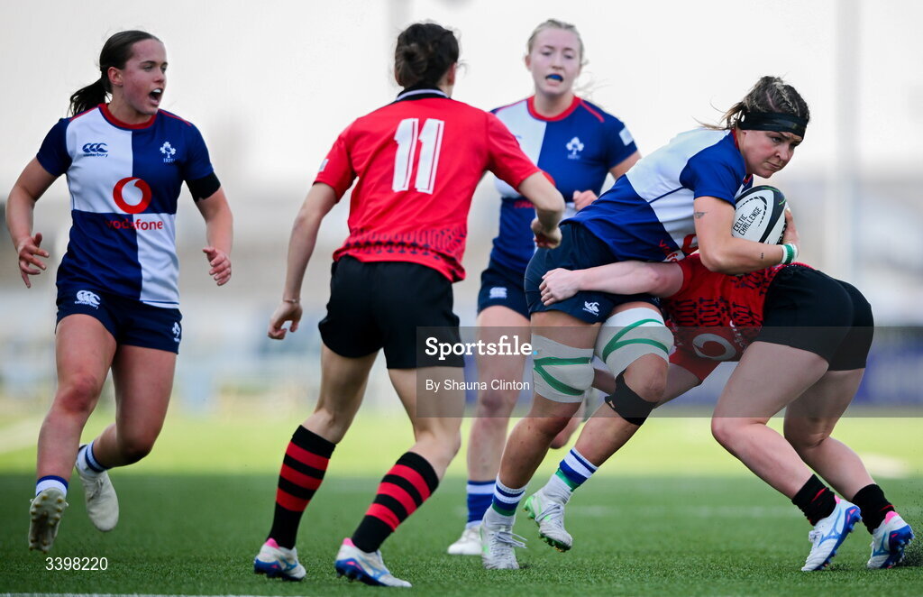 21 March 2026; Erin King of Wolfhounds is tackled by Seren Lockwood of Brython Thunder during the Celtic Challenge semi-final match between Wolfhounds and Brython Thunder at Dexcom Stadium in Galway. Photo by Shauna Clinton/Sportsfile