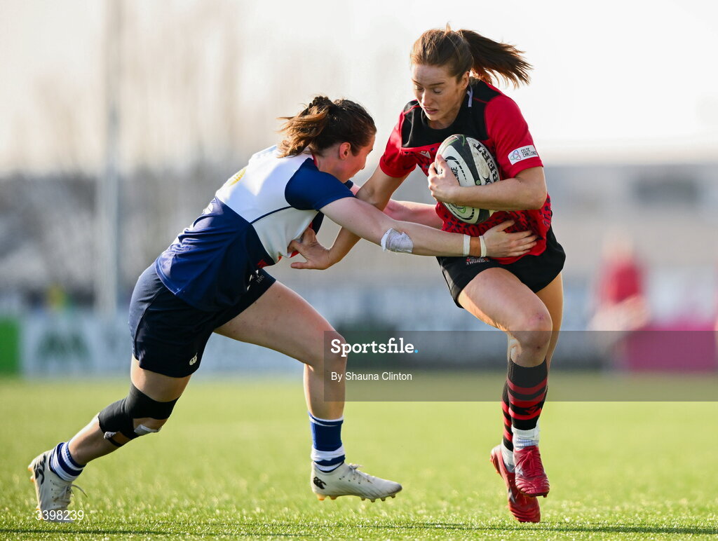 21 March 2026; Lisa Neumann of Brython Thunder is tackled by Eve Higgins of Wolfhounds during the Celtic Challenge semi-final match between Wolfhounds and Brython Thunder at Dexcom Stadium in Galway. Photo by Shauna Clinton/Sportsfile