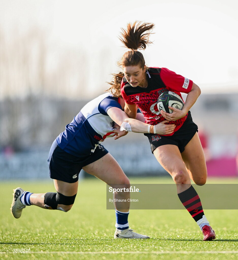 21 March 2026; Lisa Neumann of Brython Thunder is tackled by Eve Higgins of Wolfhounds during the Celtic Challenge semi-final match between Wolfhounds and Brython Thunder at Dexcom Stadium in Galway. Photo by Shauna Clinton/Sportsfile