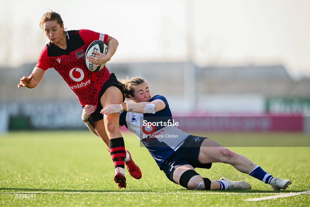 21 March 2026; Lisa Neumann of Brython Thunder is tackled by Eve Higgins of Wolfhounds during the Celtic Challenge semi-final match between Wolfhounds and Brython Thunder at Dexcom Stadium in Galway. Photo by Shauna Clinton/Sportsfile