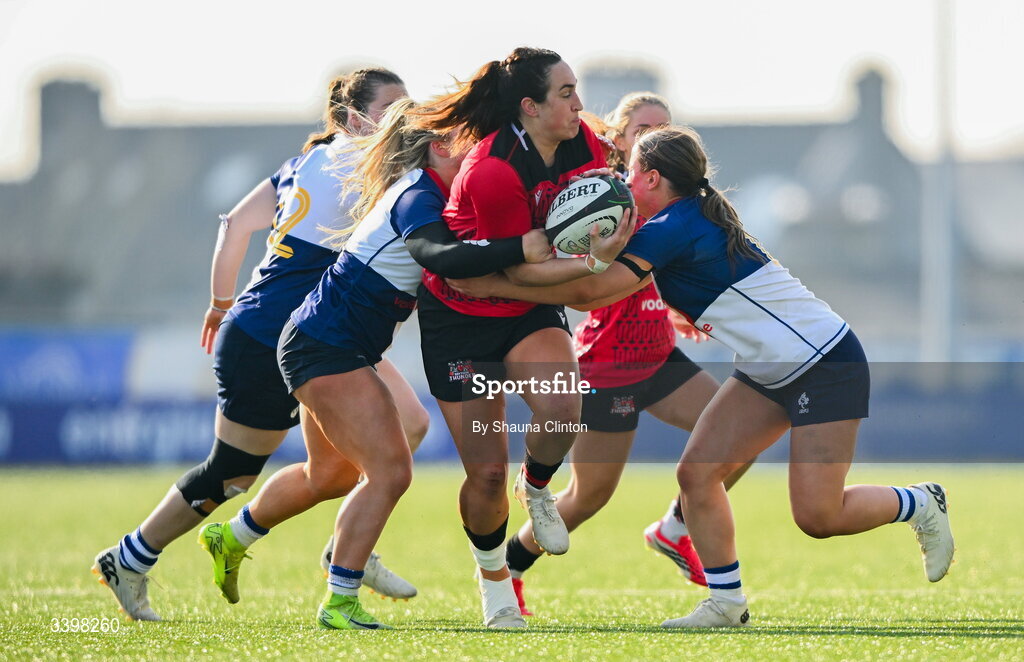 21 March 2026; Courtney Keight of Brython Thunder is tackled by Wolfhounds players Aoife Dalton, left, and Robyn O'Connor during the Celtic Challenge semi-final match between Wolfhounds and Brython Thunder at Dexcom Stadium in Galway. Photo by Shauna Clinton/Sportsfile