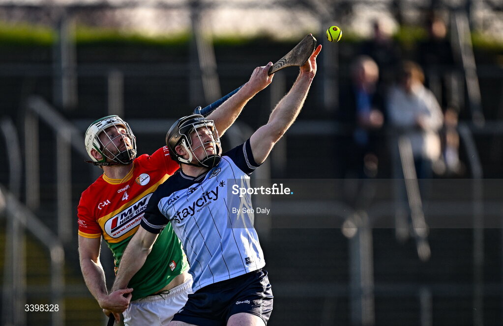 21 March 2026; Cian O’Sullivan of Dublin in action against Paul Doyle of Carlow during the Allianz Hurling League Division 1B match between Carlow and Dublin at Netwatch Cullen Park in Carlow. Photo by Seb Daly/Sportsfile