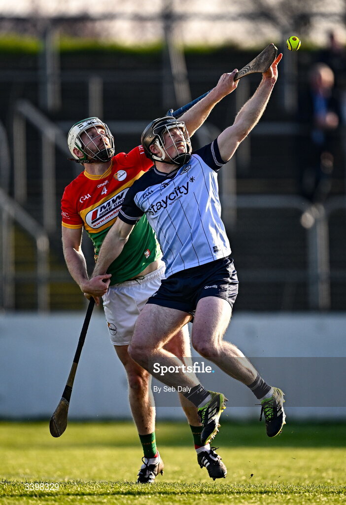 21 March 2026; Cian O’Sullivan of Dublin in action against Paul Doyle of Carlow during the Allianz Hurling League Division 1B match between Carlow and Dublin at Netwatch Cullen Park in Carlow. Photo by Seb Daly/Sportsfile