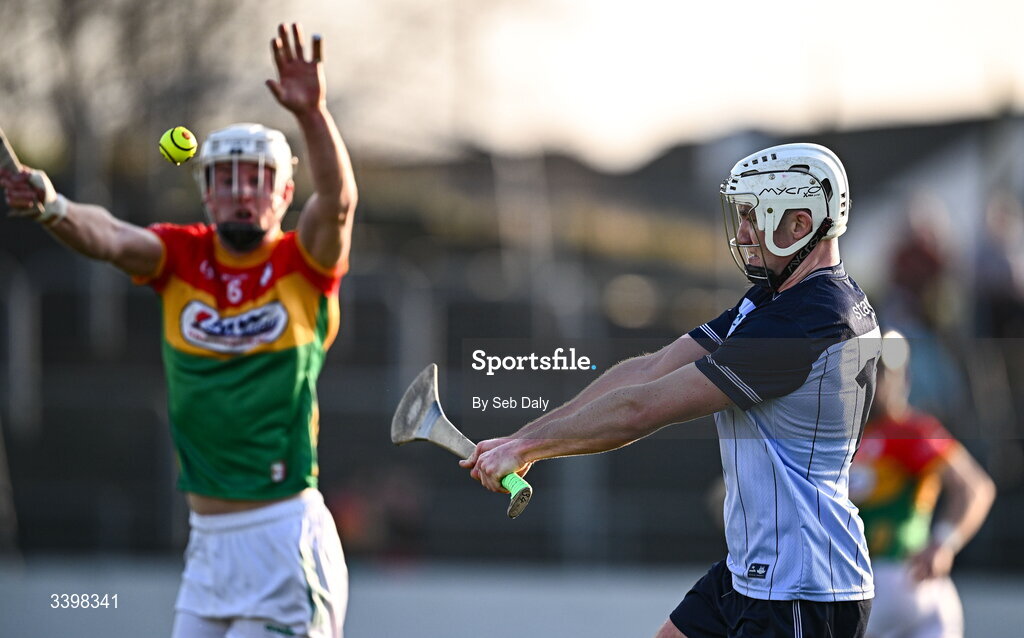 21 March 2026; Darragh Power of Dublin in action against Kevin McDonald of Carlow during the Allianz Hurling League Division 1B match between Carlow and Dublin at Netwatch Cullen Park in Carlow. Photo by Seb Daly/Sportsfile