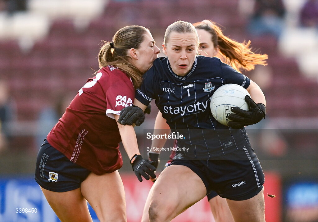 21 March 2026; Dublin goalkeeper Abby Shiels is tackled by Kate Thompson of Galway during the Lidl Ladies National Football League Division 1 Round 6 match between Galway and Dublin at Tuam Stadium in Tuam, Galway. Photo by Stephen McCarthy/Sportsfile