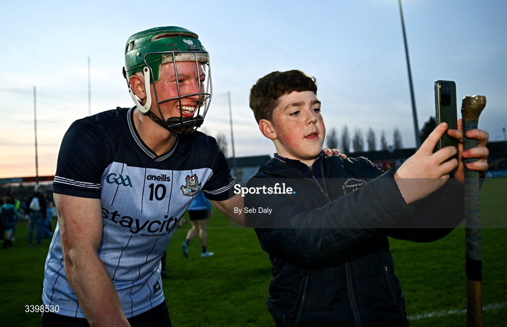 21 March 2026; Fergal Whitely of Dublin takes a selfie with a supporter after the Allianz Hurling League Division 1B match between Carlow and Dublin at Netwatch Cullen Park in Carlow. Photo by Seb Daly/Sportsfile